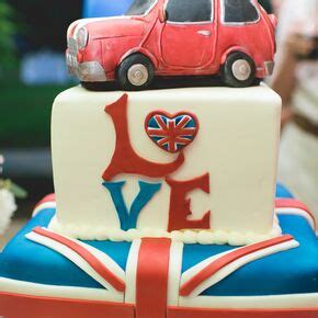 Naked Vanilla Wedding Cake With Soft Romantic Flowers