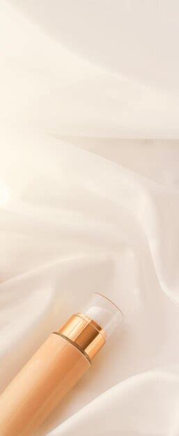 Premium Photo Tonal Bb Cream Bottle Makeup Fluid Foundation Base For Nude Skin Color On Silk