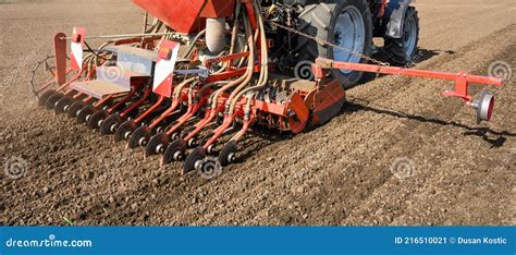 Farmer With Tractor Seeding Crops At Field Stock Image Image Of