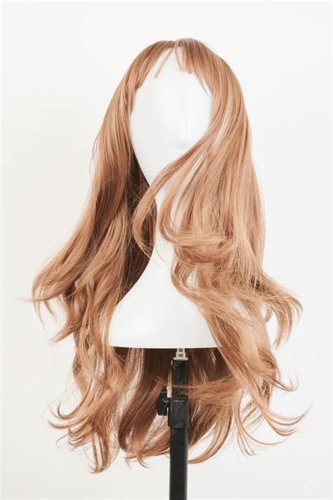 Premium Photo Natural Looking Dark Blonde Wig On White Mannequin Head