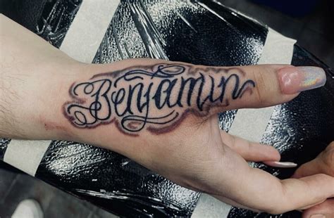 11 Name On Hand Tattoo Ideas Youll Have To See To Believe