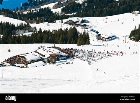 View Of Mountain Village And Downhill Ski Slopes In Saalbach