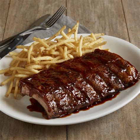 Half Rack Of Slow Roasted Baby Back Pork Ribs Menu Bj S Restaurants