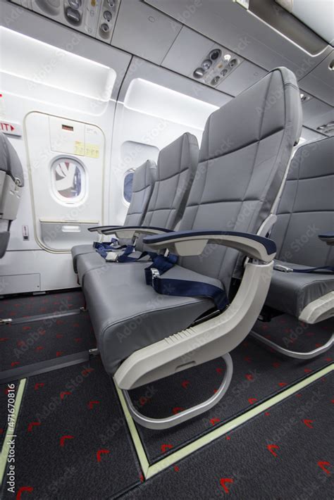 typical seat row   airbus  commercial aircraft stock photo