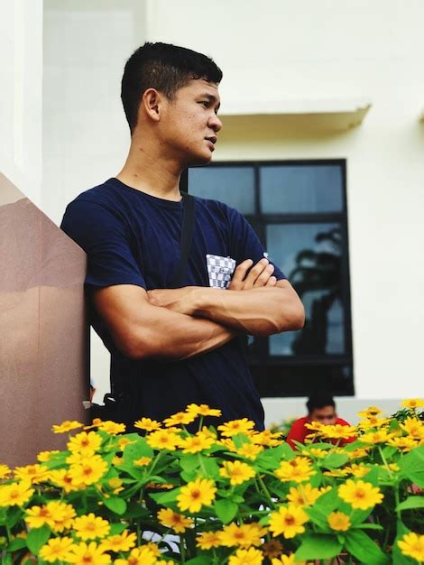 premium photo young man   camera