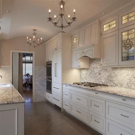 Modern White Kitchen With Marble Countertops Hgtv Marble