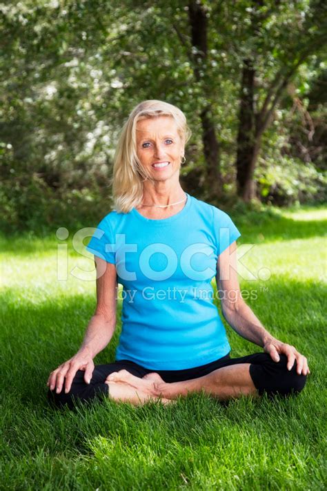 Beautiful Mature Woman In Yoga Pose Stock Photo Royalty Free Images Freeimages