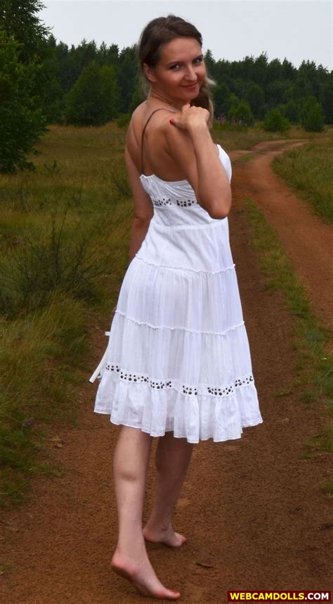 Blonde MILF In White Dress And Walking With Bare Feet On Webcamdolls
