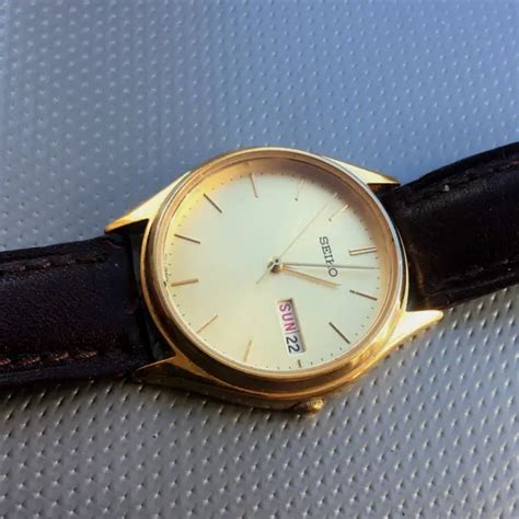 1987 Mens Seiko 7n43 8a99 Wrist Watch Day Date Gold Brown 30m Wr £