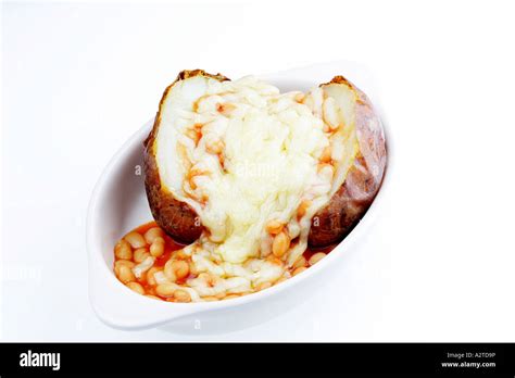Jacket Potato With Baked Beans And Cheese Stock Photo Alamy