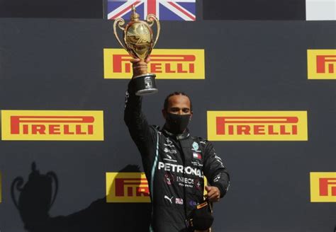 F1 PIX: Hamilton wins British GP with punctured tyre - Rediff Sports