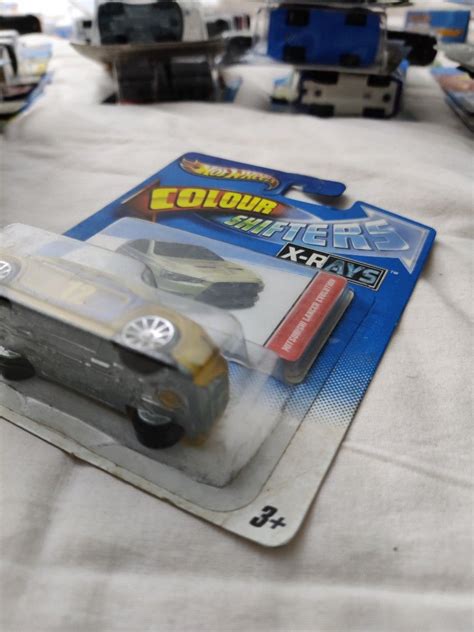 Hot Wheels Colour Shifters 1 64 Mitsubishi Lancer Evolution X X Rays Hobbies Toys Toys