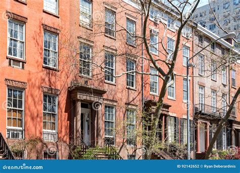 Block Of Historic Brownstone Buildings In Manhattan New York Ci Stock