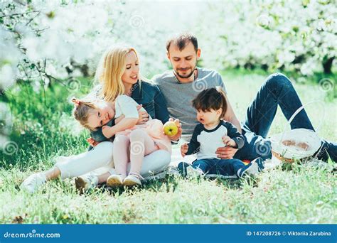 happy family mom dad  kids daughter  son  fun outdoor