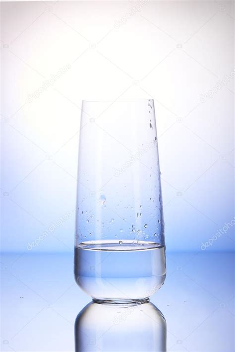 full drinking glass  reflection  drops  water stock