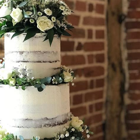 Semi Naked Wedding Cake With Fresh Flowers