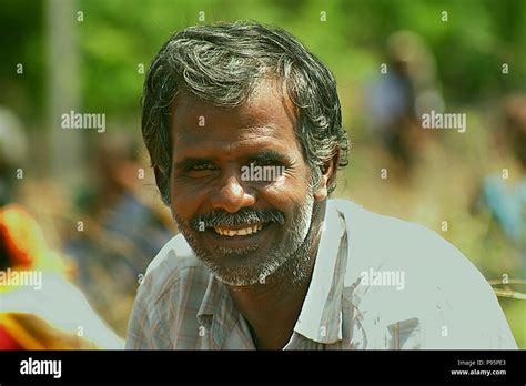 A aged man portrait on farmland. nature background Stock Photo - Alamy