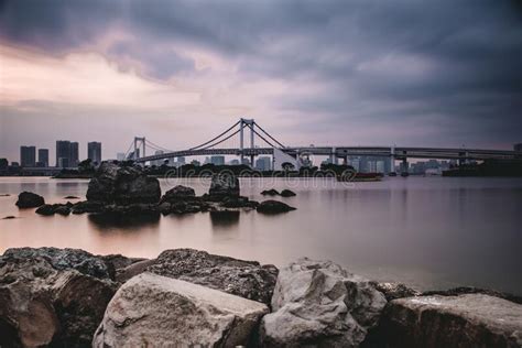 View of Tokyo Rainbow Bridge at Sunset Stock Photo - Image of tour ...