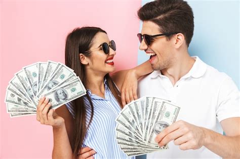 Premium Photo Excited Young Couple Standing Isolated