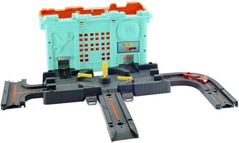 Hot Wheels Miejskie tory Zestaw w pudełku Pojazdy tory i garaże
