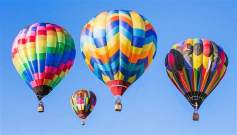 Premium Photo Spectacular View Colorful Hot Air Balloons Soaring In The Blue Sky