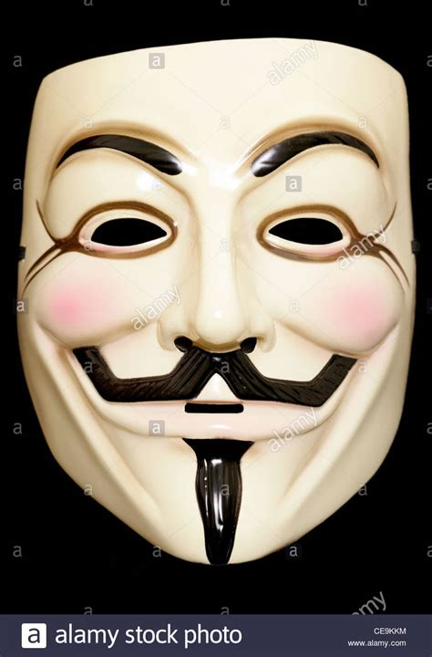 Guy fawkes mask on a black background Stock Photo - Alamy