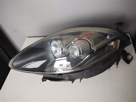 Lampa lewa Reflektor lewy Fiat Bravo II Lift 00518778840 za 450 zł z