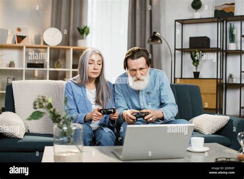 Mature Couple Playing Video Game Hi Res Stock Photography And Images Alamy