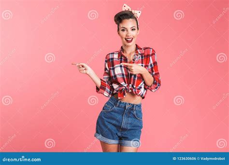 Portrait Of A Smiling Beautiful Brunette Pin Up Woman Stock Photo