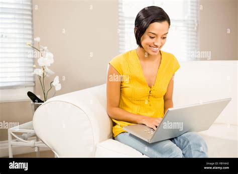 Smiling Brunette Using Laptop Stock Photo Alamy