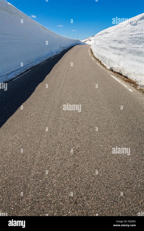 Mountain road in Norway with high snow wall Stock Photo - Alamy