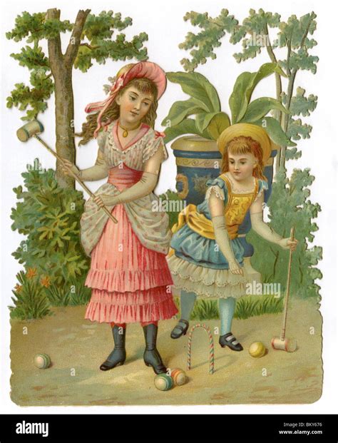 Two Girls Playing Croquet Stock Photo Alamy