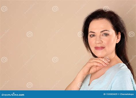 Portrait Of Charming Mature Woman With Healthy Beautiful Face Skin And