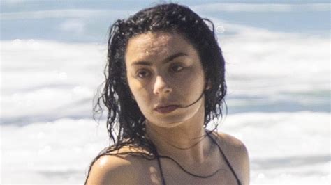 Charli Xcx Shows Off Her Incredible Figure In A Skimpy Black Bikini As She Hits The Beach In