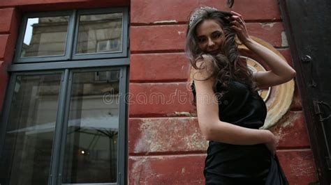 Miss Brunette Black Dress With Bright Makeup Crown Posing In The Street Stock Video Video