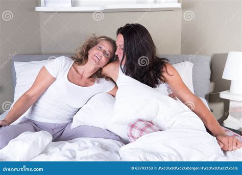 Two Attractive Women Hugging Each Other In Bed Stock Image Image Of Skin Blonde 63793153