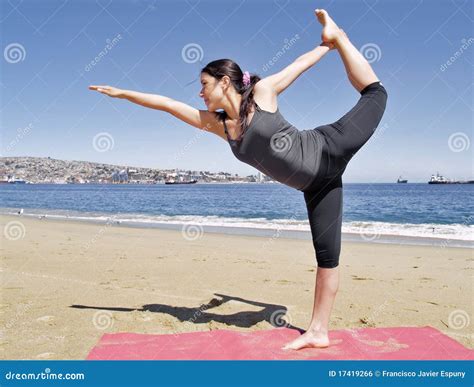 Bikram Yoga Dandayamana Dhanurasana Pose at Beach Stock Photo - Image ...