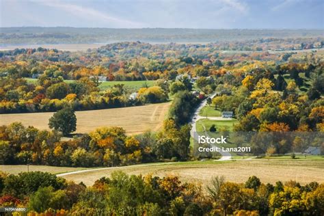 Rural Midwestern Landscape With Woods Fields Roads And Houses In The
