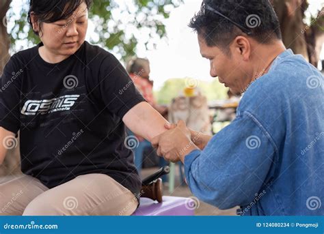 Thai Massage By Wood Hammer For Treat Aches Pains Editorial Stock Image Image Of Masseur