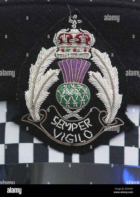 Detail view of the Scottish police logo, seen embroidered on a police ...