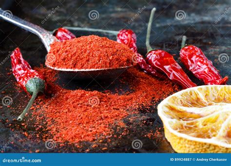 Vibrant Red Mexican Hot Chilli Pepper Whole And Grounded Stock Image