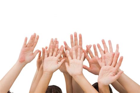 Premium Photo People Raising Hands In The Air