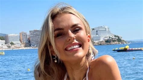 Tallia Storm Shows Off Her Incredible Figure In A Tiny Yellow Bikini As She Debuts Her Latest