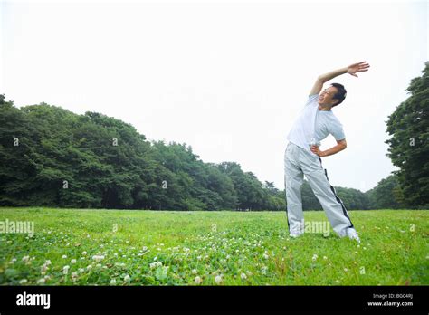 Mature Man Stretching Stock Photo Alamy