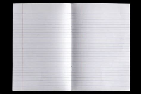 white lined paper isolated  black background stock photo