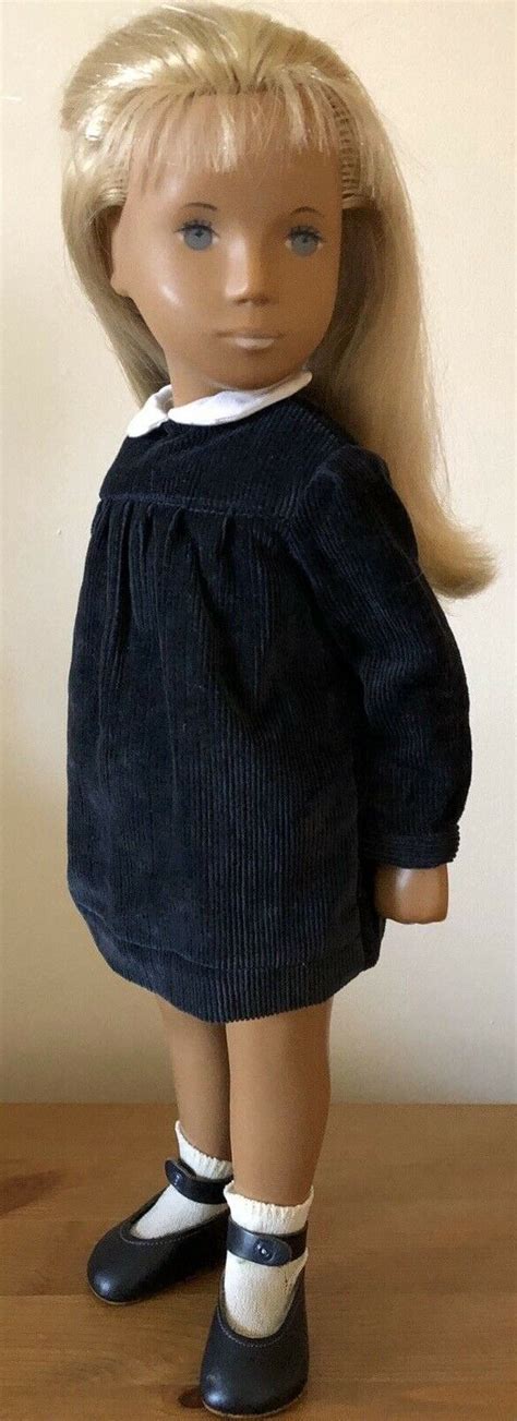 Blonde Sasha In Navy Cord Dress With Press Studs