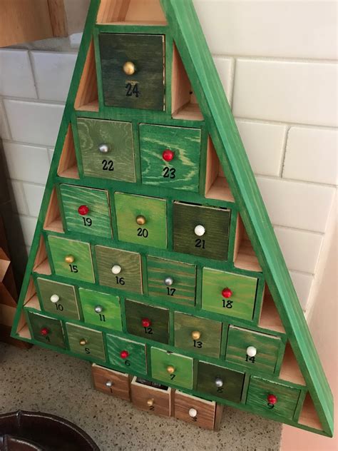 12 Domestic Arts to Teach at Home: Dollar Bills on the Door: An Advent