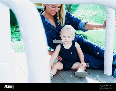 Blonde Mother And Son Having Fun Outdoor Summer Time Concept Stock Photo Alamy