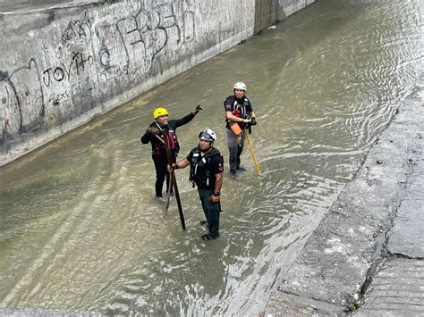 Contin A La B Squeda De Joven Arrastrado Por La Corriente