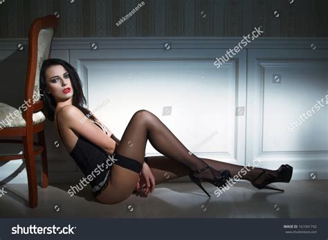 Sexy Brunette Model Sitting On Floor Stock Photo 161041742 Shutterstock
